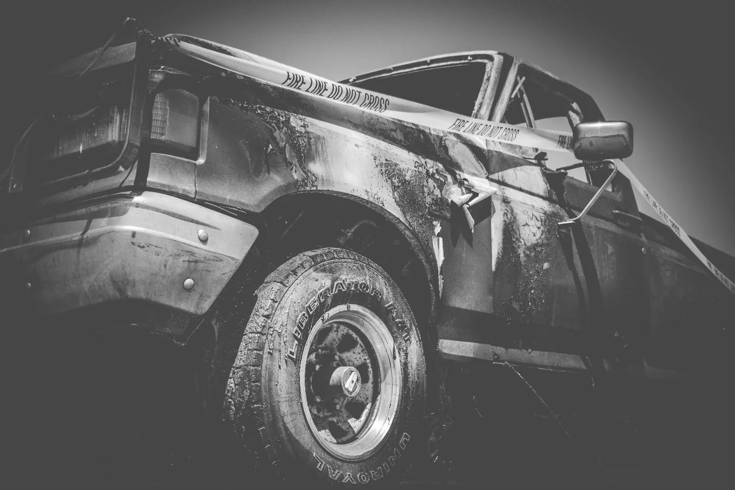 closeup on a damaged truck black and white